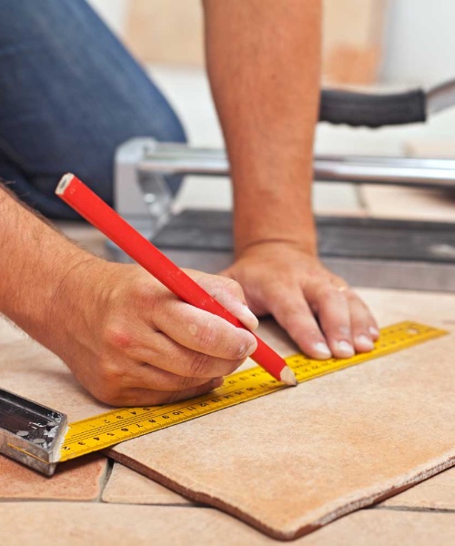 Call Footprints Floors for tile replacement.